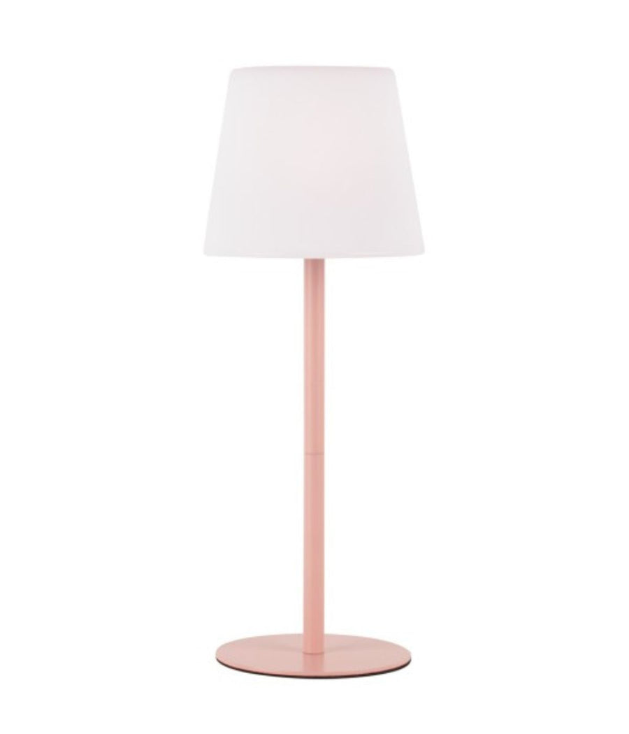 Lampada da tavolo Outdoors rosa con paralume bianco, vista frontale su sfondo bianco.